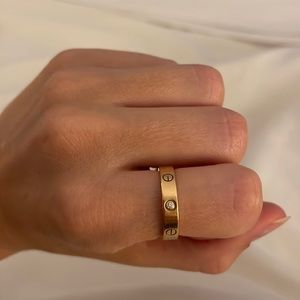 Cartier love ring in yellow gold and one diamond